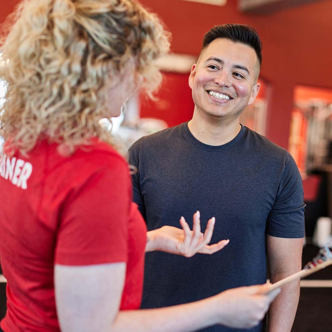 Young Men playing basketball indoors