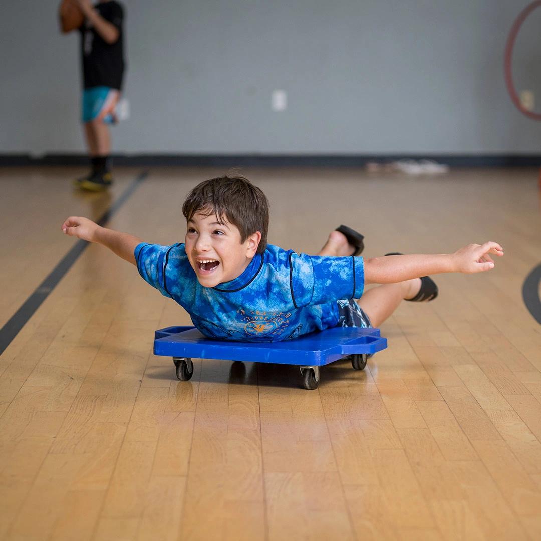 Little boy playing in bubbles